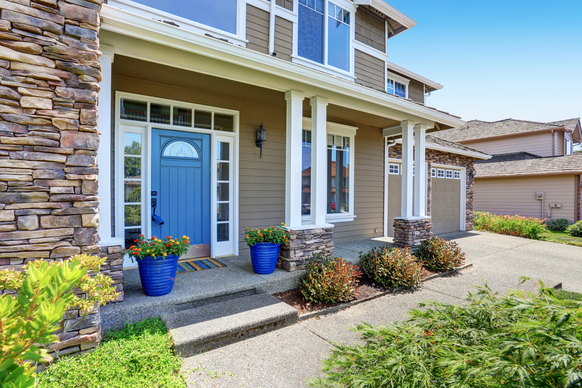 Brown House With Blue Front Door